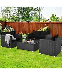 Slickblue 4 Pieces Patio Rattan Conversation Set with Padded Cushion and Tempered Glass Coffee Table