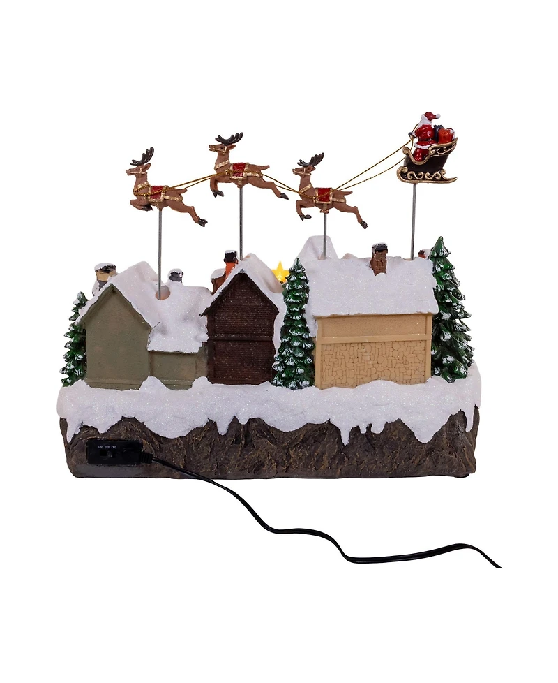 Kurt Adler 7.3-Inch Battery Operated Multicolor Led Lighted Musical Santa and Sleigh Table Piece