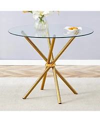Simplie Fun Round clear glass dining table with a unique shape for 4-6 people, with ring-shaped gathered gold metal legs, suitable for desks, kitchens