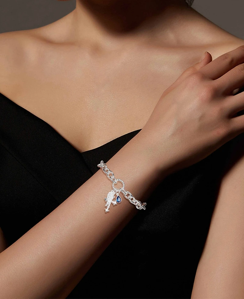 Unwritten Cubic Zirconia Wing Cross Charm Bracelet