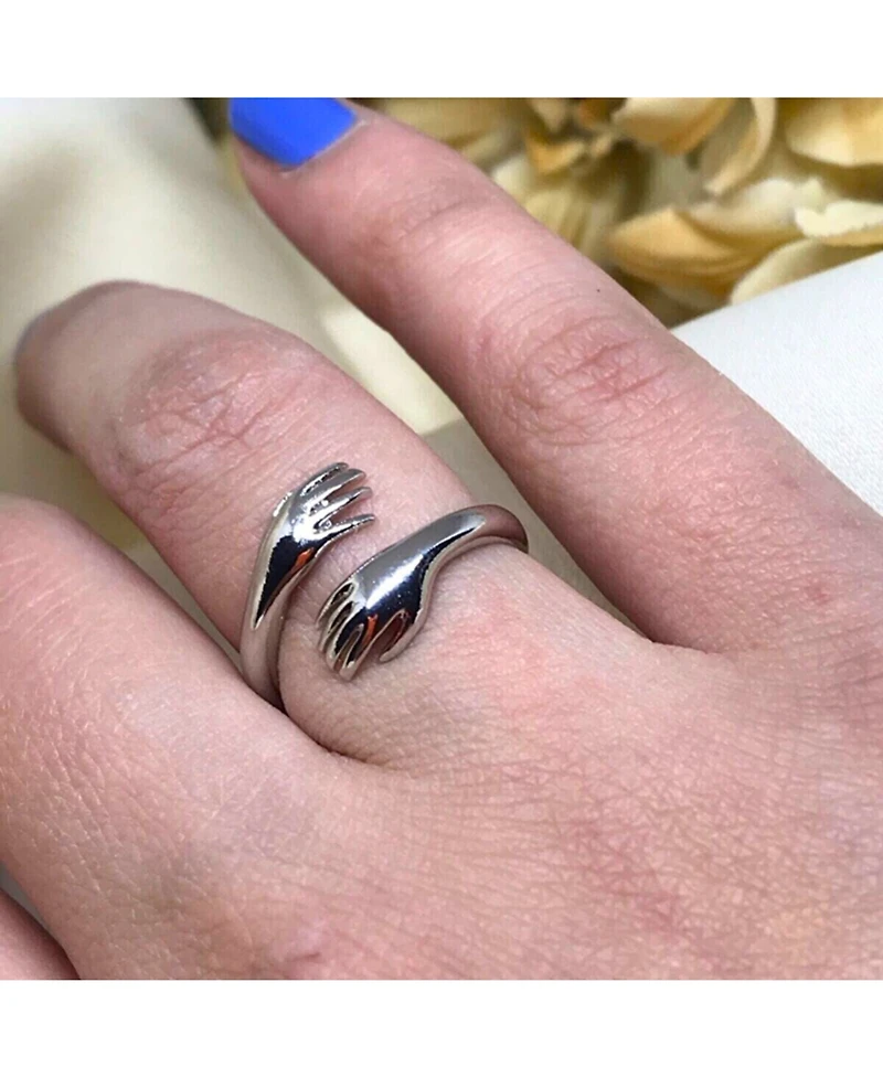 Spero London Hug Ring With Hands Sterling Silver and Gold Plated
