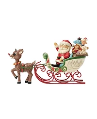 Jim Shore Rudolph Pulling Santa in Sled Figurine