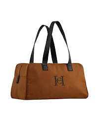Free Carolina Herrera Duffle with $120 purchase from the Carolina Herrera Bad Boy Men's Fragrance Collection.