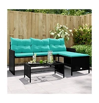 Garden Sofa Black sofa with blue cushions