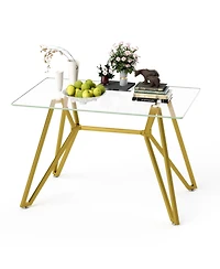 Lovmor 47.3" rectangular glass dining table with sturdy metal legs, modern design, seats 1–6 people, perfect for home or kitchen dining.
