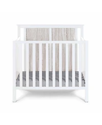Flynama Mini Crib with Mattress Pad 3in1 Convertible Design Reversible Back Panel and Adjustable Mattress Heights for Nursery