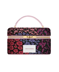Free Floral Carolina Herrera pouch with any $150 Carolina Herrera fragrance and/or makeup Collection purchase