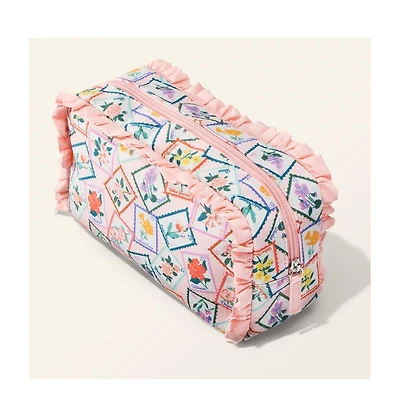 Free 9-Pc. Sampler and pouch with any $150 Beauty Purchase