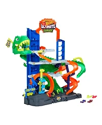 Hot Wheels 1:64 scale City Ultimate T-Rex Garage with 2 Toy Cars & Storage for 50+, Race & Stunt, Dino Nemesis