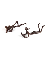 Danya B. Man and Woman Leisurely Reading Bronze Sculptures - Set of 2