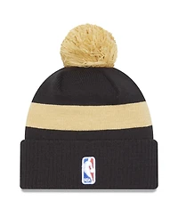 Men's New Era Black Toronto Raptors 2022/23 City Edition Official Cuffed Pom Knit Hat