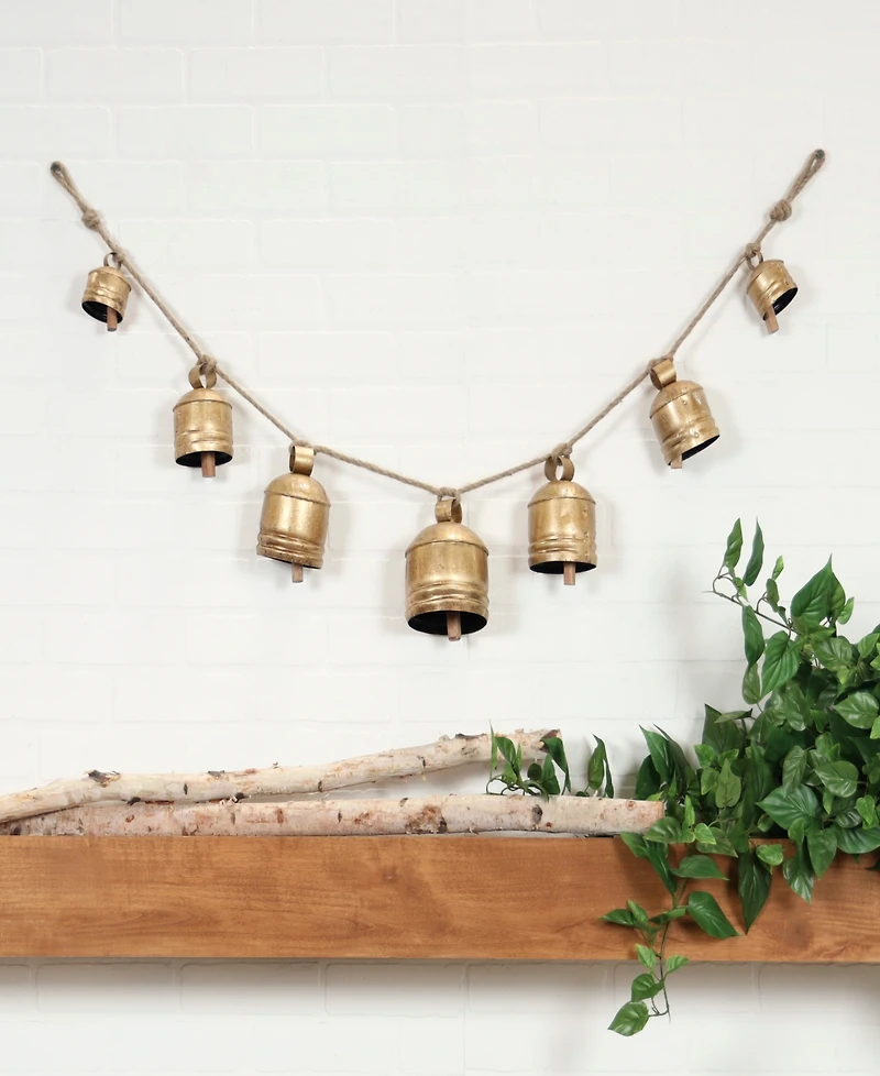 Rosemary Lane Metal Tibetan Inspired String Hanging Decorative Cow Bell with Jute Hanging Rope, 53" x 5" x 7"