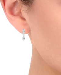 Diamond Graduated Oval Huggie Hoop Earrings (1/2 ct. t.w.) 14k White or Yellow Gold