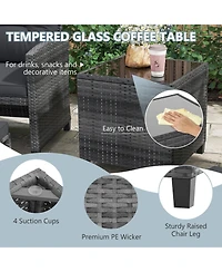 5-Piece Outdoor Rattan Furniture Set with 2 Ottomans and Glass Coffee Table