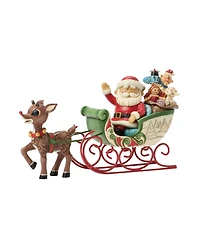 Jim Shore Rudolph Pulling Santa in Sled Figurine