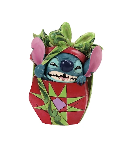 Jim Shore Stitch Tearing Present Figurine
