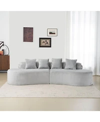 Streamdale Modern curved flannelette sofa with pillows in light gray.