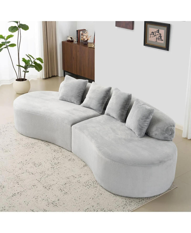 Streamdale Modern curved flannelette sofa with pillows in light gray.
