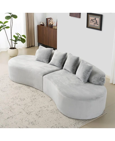Streamdale Modern curved flannelette sofa with pillows in light gray.