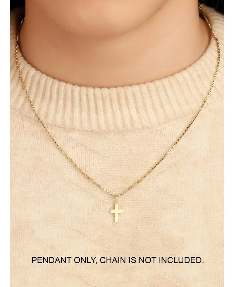 Devata Cross Pendant in , approx. 0.4 grams.