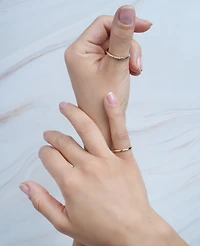 Wrapped Diamond 3-Stone Ring (1/20 ct. t.w.) 10K Yellow Gold with White Rhodium