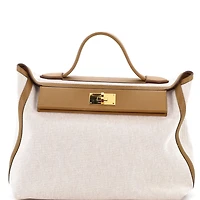 Pre-Owned HERMES 35 24/24 Bag Canvas and Swift