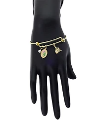 Unwritten Cubic Zirconia and Mother of Pearl Flower and Bee Charm Bangle Bracelet