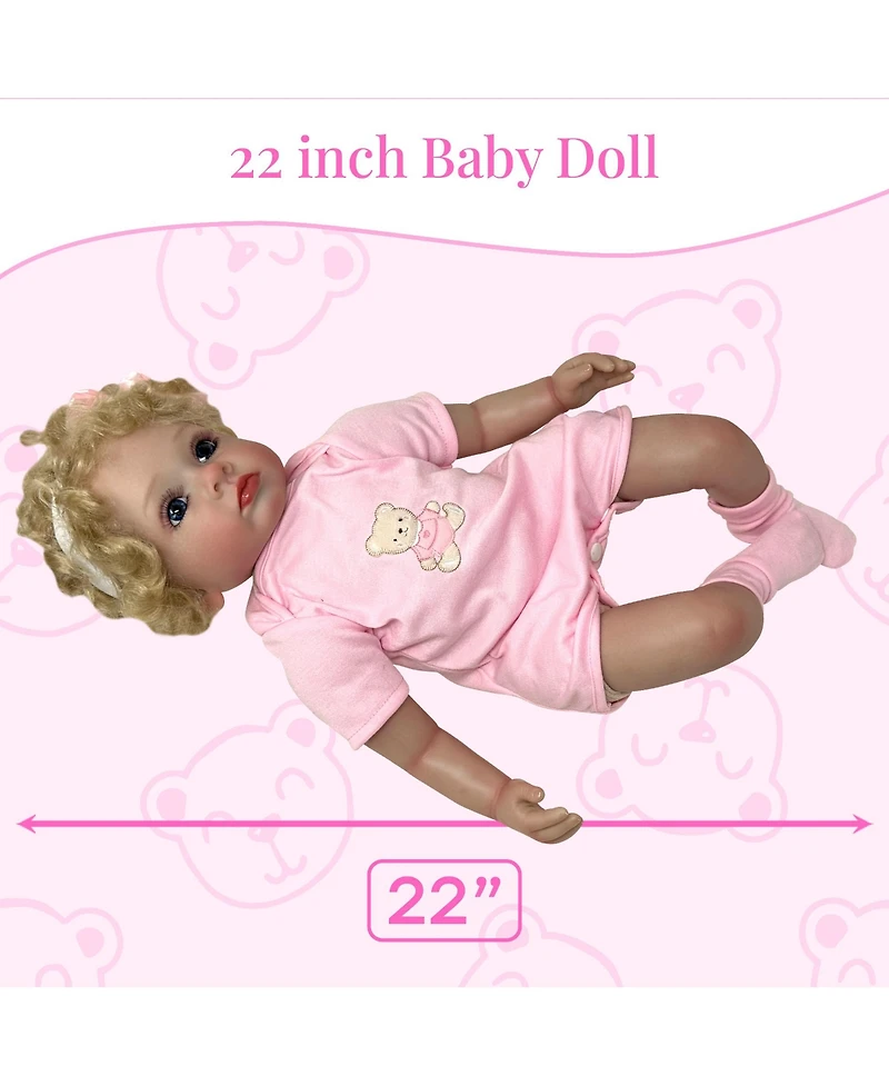 The New York Doll Collection 22 inch reborn baby doll with blond curly hair outfit/hairband