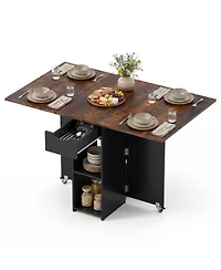 Gymax Folding Dining Table w/2 Open Shelves and Drawer 2 Lockable Universal Wheels