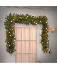 National Tree Company 9' x 12" Norwood Fir Garland with 100 Clear Lights