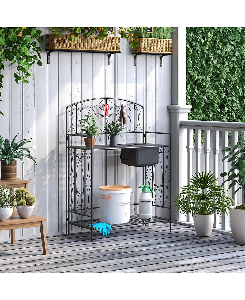 Outsunny Folding Potting Bench Table, Metal Garden Workstation, Work Bench with Large Built-in Bag with Cover, 5 Hanging Hooks & Storage Shelf, Leaf P