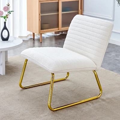 White armless sofa chair with gold legs. Versatile for any space