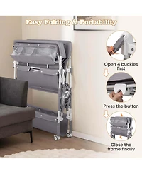 Costway Portable Baby Changing Table with Wheels Adjustable Height Large Storage Rack