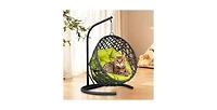 This rattan cat swing bed with cushion and stand provides a cozy swinging space for cats and small pets offering comfort and relaxation indoors