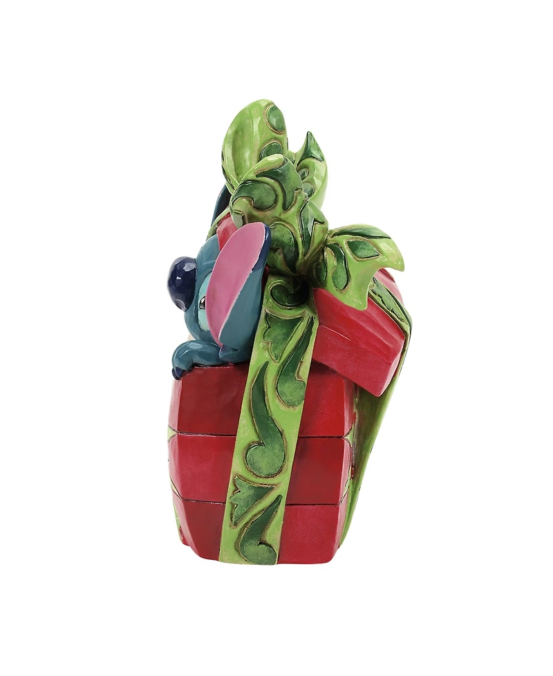 Jim Shore Stitch Tearing Present Figurine