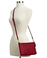 Coach Legacy Patent Signature Crossbody bag