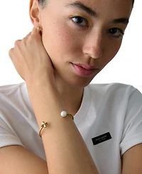 kate spade new york Imitation Pearl and Cubic Zirconia Flower Bracelet (also Gold-Tone)