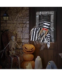 Animated Halloween Decoration 18” Hanging Skull Prisoner with Light-up Eyes