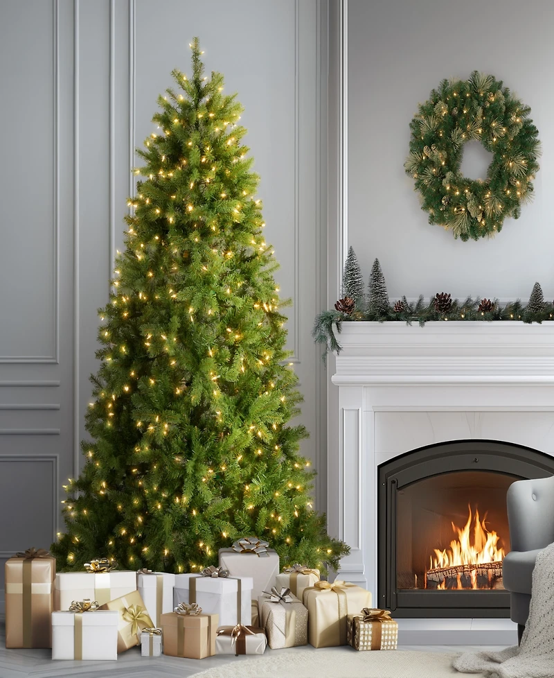 National Tree 6.5' "Feel Real" Downswept Douglas Fir Hinged Tree with 650 Clear Lights