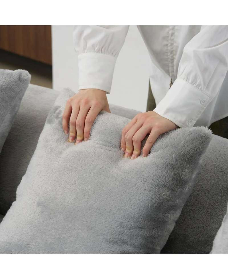 Streamdale Modern curved flannelette sofa with pillows in light gray.