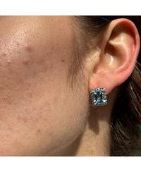 Suzy Levian New York Sterling Silver Emerald Cut Topaz And White Stud Earrings