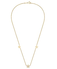 Wrapped Diamond Multi-Flower Necklace (1/10 ct. t.w.) in 10k Yellow Gold