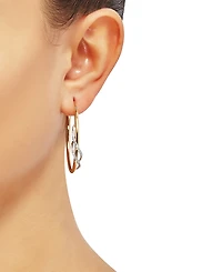 Diamond Twist Medium Twist Hoop Earrings (1/5 ct. t.w.) in 10k Gold, 1.5"