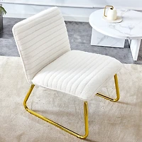 White armless sofa chair with gold legs. Versatile for any space