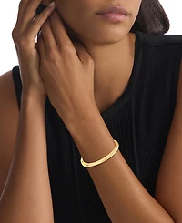 Calvin Klein Gold-Tone Stainless Steel Twist Bangle Bracelet