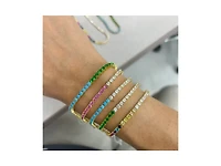 Etoielle Gold Tone Simulated Pink Sapphire and Alternating Cz Tennis Bracelet