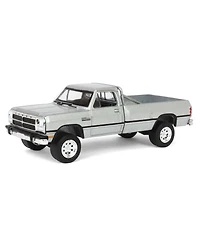 1/64 1992 Dodge Ram D250 Power Ram Lifted Rollbar Silver All-Terrain