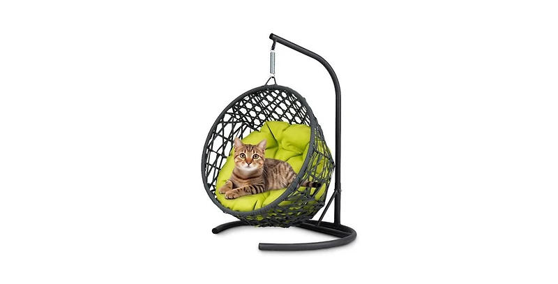 This rattan cat swing bed with cushion and stand provides a cozy swinging space for cats and small pets offering comfort and relaxation indoors