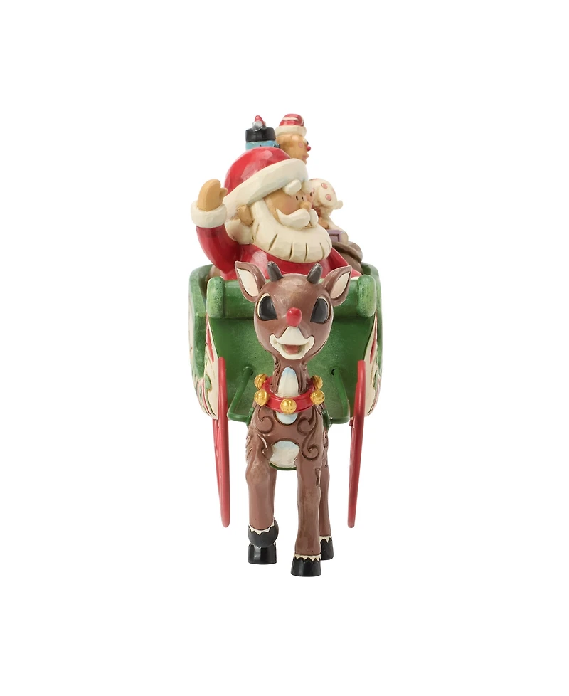 Jim Shore Rudolph Pulling Santa in Sled Figurine