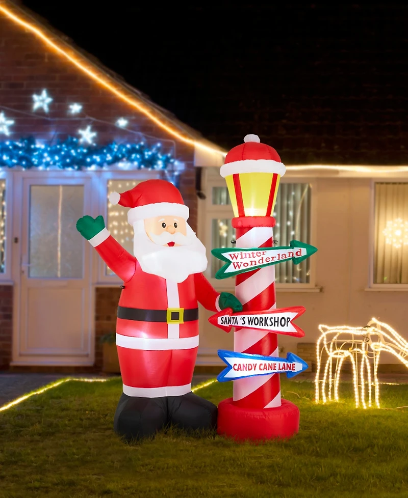 Glitzhome 7" Lighted Inflatable Santa with Lamp Post Sign Decor